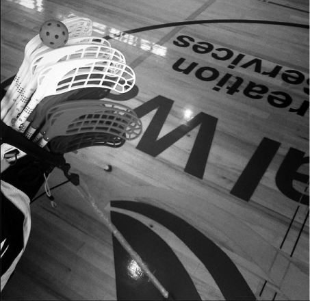 greyscale-Generation-Floorball-sticks-in-bag